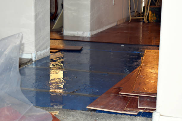 Professional Flood Damage Restoration technician working in Genesee Depot, WI